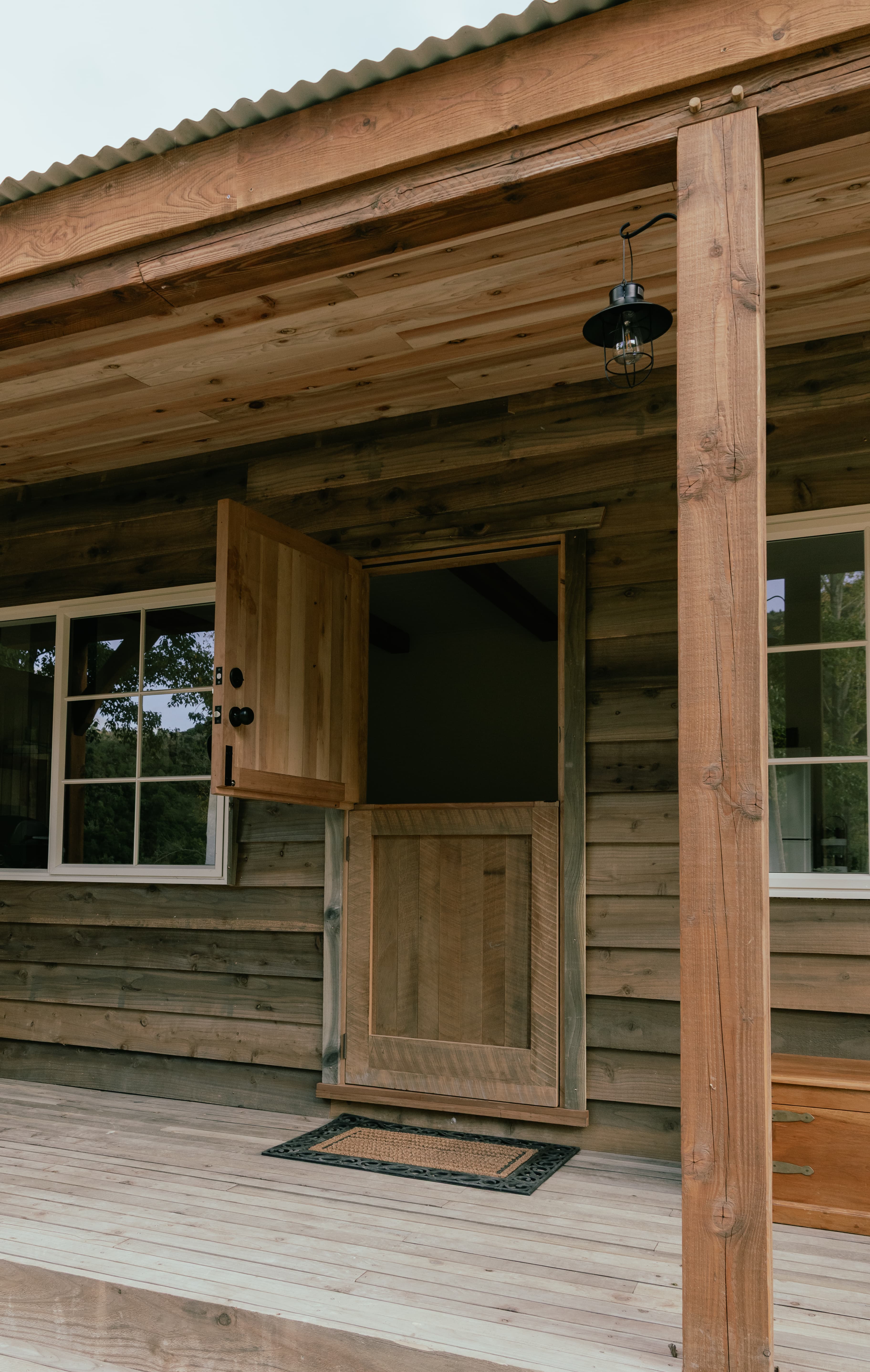 Rustic farmstay accommodation in Hawke’s Bay with fireplace, full kitchen, and countryside views